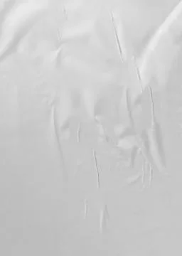 Texture of thin crumpled white vertical paper Stock Photos