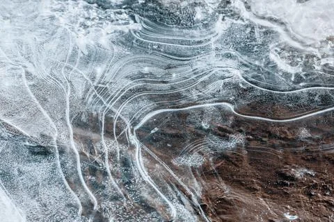 The texture of the thin ice on the water surface Stock Photos