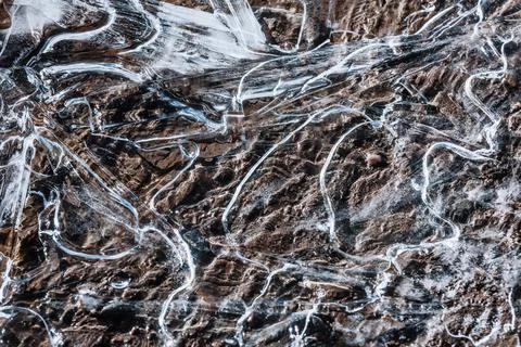 The texture of the thin ice on the water surface Stock Photos