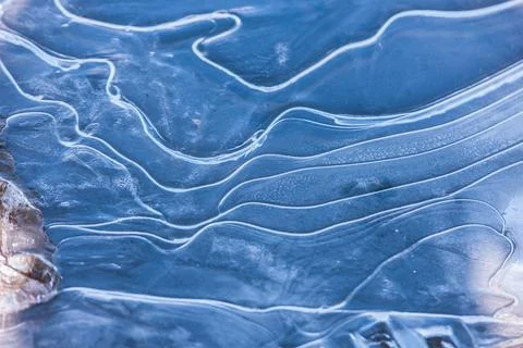 The texture of the thin ice on the water surface Stock Photos