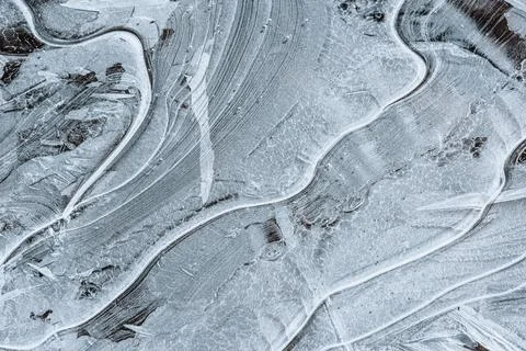 The texture of the thin ice on the water surface Stock Photos