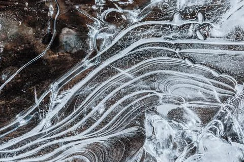 The texture of the thin ice on the water surface Stock Photos