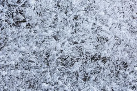 The texture of the thin ice on the water surface Stock Photos