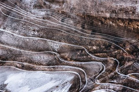 The texture of the thin ice on the water surface Stock Photos