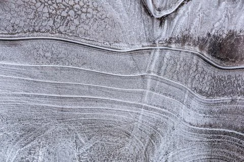 The texture of the thin ice on the water surface Stock Photos