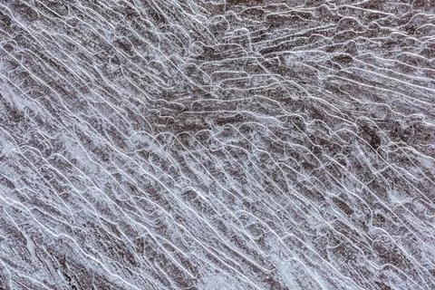 The texture of the thin ice on the water surface Stock Photos