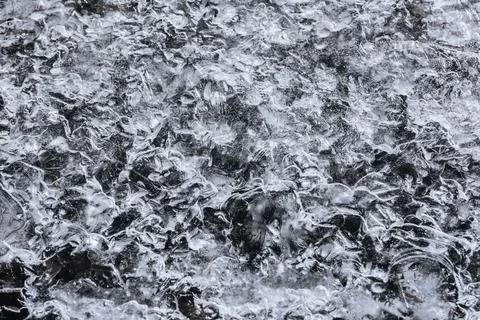 The texture of the thin ice on the water surface 스톡 사진