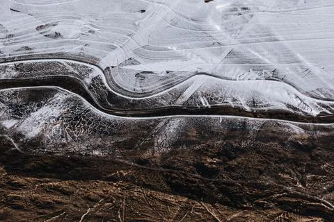 The texture of the thin ice on the water surface Stock Photos