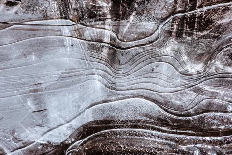 The texture of the thin ice on the water surface Stock Photos