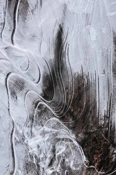 The texture of the thin ice on the water surface Stock Photos