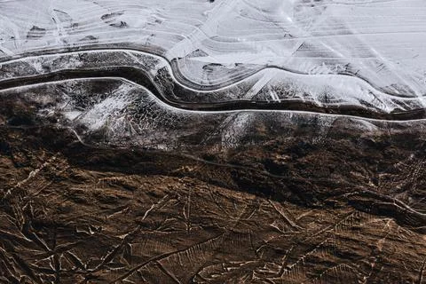 The texture of the thin ice on the water surface Stock Photos