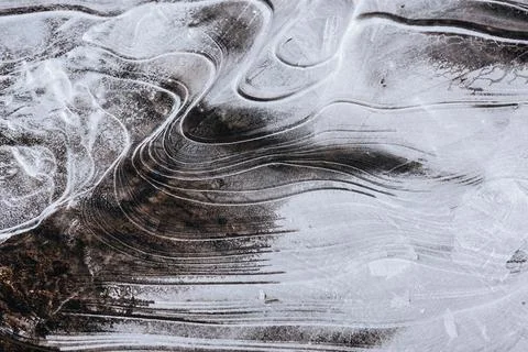 The texture of the thin ice on the water surface Stock Photos