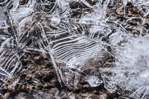 The texture of the thin ice on the water surface Stock Photos
