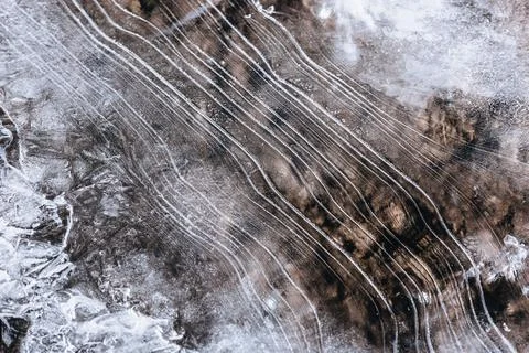 The texture of the thin ice on the water surface Stock Photos