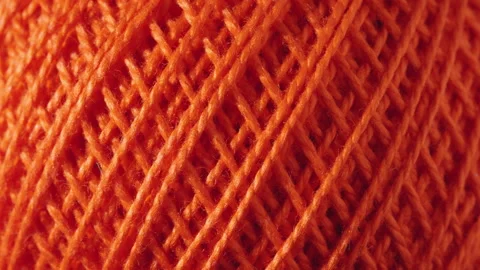 Texture of threads in a spool of orange color. Stock Footage 247366978