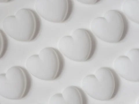 Texture with three-dimensional hearts Stock Photos