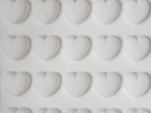 Texture with three-dimensional hearts Stock Photos
