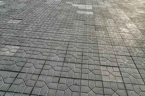 The texture of a tiled pavement with perspective. Stock Photos