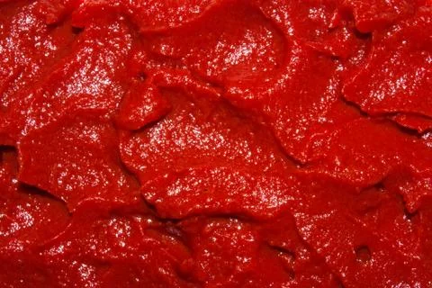 The texture of tomato paste.Ketchup background. Stock Photos