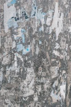 Texture of torn advertisement on an old rusty billboard panel Stock Photos