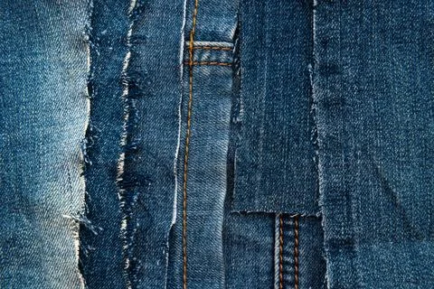 Texture from torn pieces of denim. Jeans texture. Material for sewing clothes Stock Photos