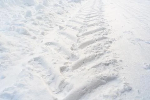 Texture trace from tractor tires on snow after a snowstorm Stock Photos