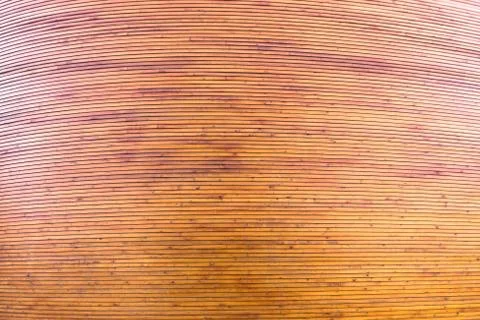 The texture of the tree is a lot of small lath boards varnished on the wall Foto stock