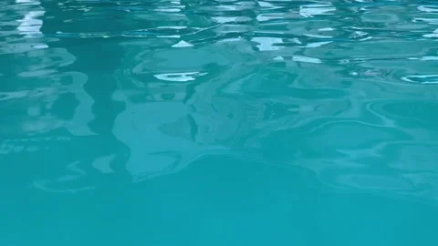The texture of the turquoise water surface with little reflection. Stock Footage 245800918