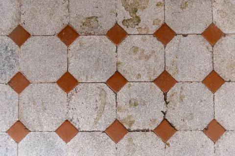 Texture of two types of different tiles brown and ivory with spots Stock Photos