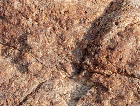 Texture of uneven brown stone Foto stock
