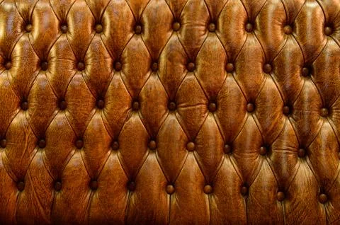 Texture of vintage brown leather sofa for background Stock Photos