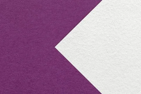 Texture of violet paper background, half two colors with white arrow, macro. Stock Photos