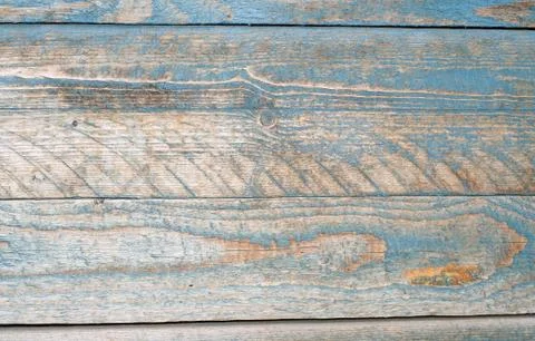 Texture of wall of blue boards with flaky paint Stock Photos