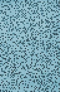 The texture of the wall, decorated with a mosaic of various small square tile Stock Photos