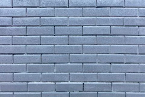 Texture of a wall from a gray brick Stock Photos