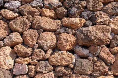 Texture wall with large mountain stones Stock Photos