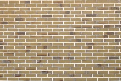 Texture of the wall, lined with smooth facing bricks Stock Photos