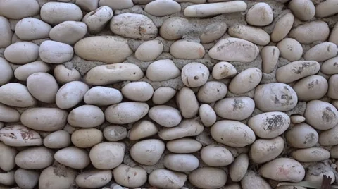 Texture of wall made of sea pebbles Stock Footage 61019942
