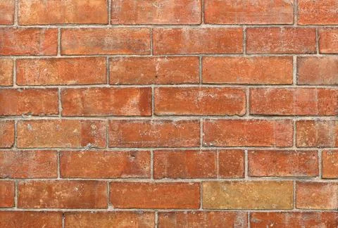 Texture of a wall in old red bricks Stock Photos