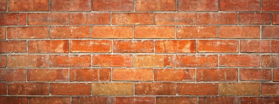 Texture of a wall in old red bricks Stock Photos