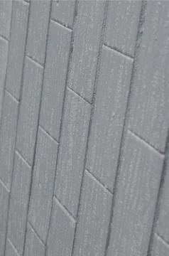 The texture of the wall from the old tile, painted gray under the influence o Stock Photos