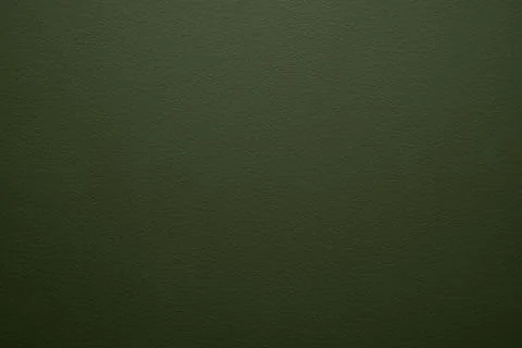The texture of the wall painted with green paint. Stock Photos