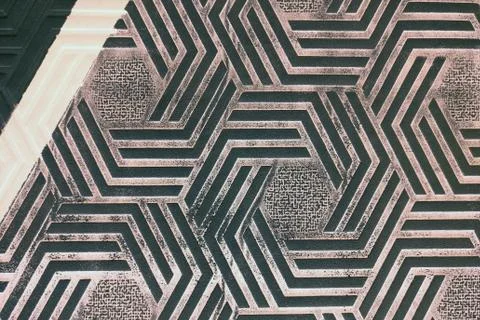 The texture of the wall with a pattern of diamond geometric shapes, backgroun Foto stock