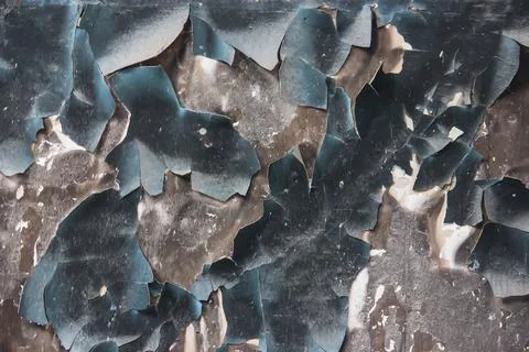 Texture of wall with peeling cracked paint - image. Stock Photos