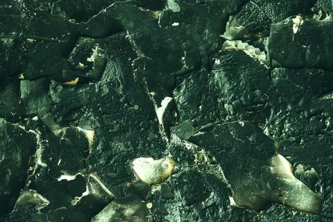 Texture of wall with peeling cracked paint - image. Stock Photos
