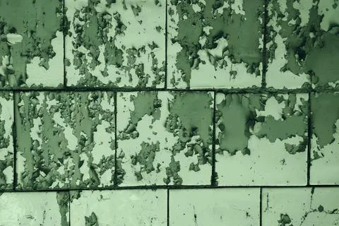Texture of wall with peeling cracked paint - image. Stock Photos