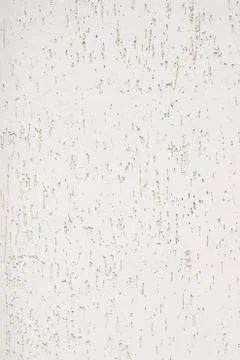 Texture of a wall with a relief cement plaster Stock Photos