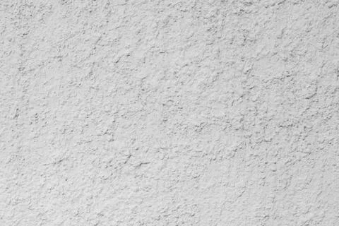 Texture of a wall with a relief cement plaster Stock Photos