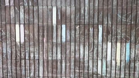 Texture from a wall surface damaged by weather. Stock Photos