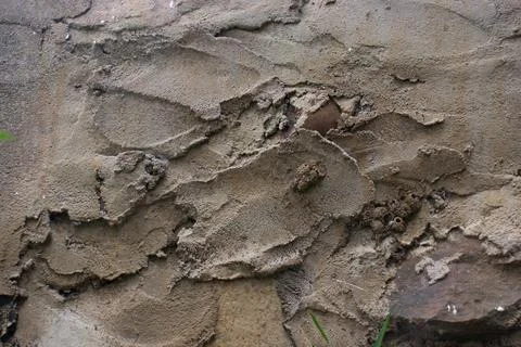 Texture on the walls of an old building made of cement Stock Photos